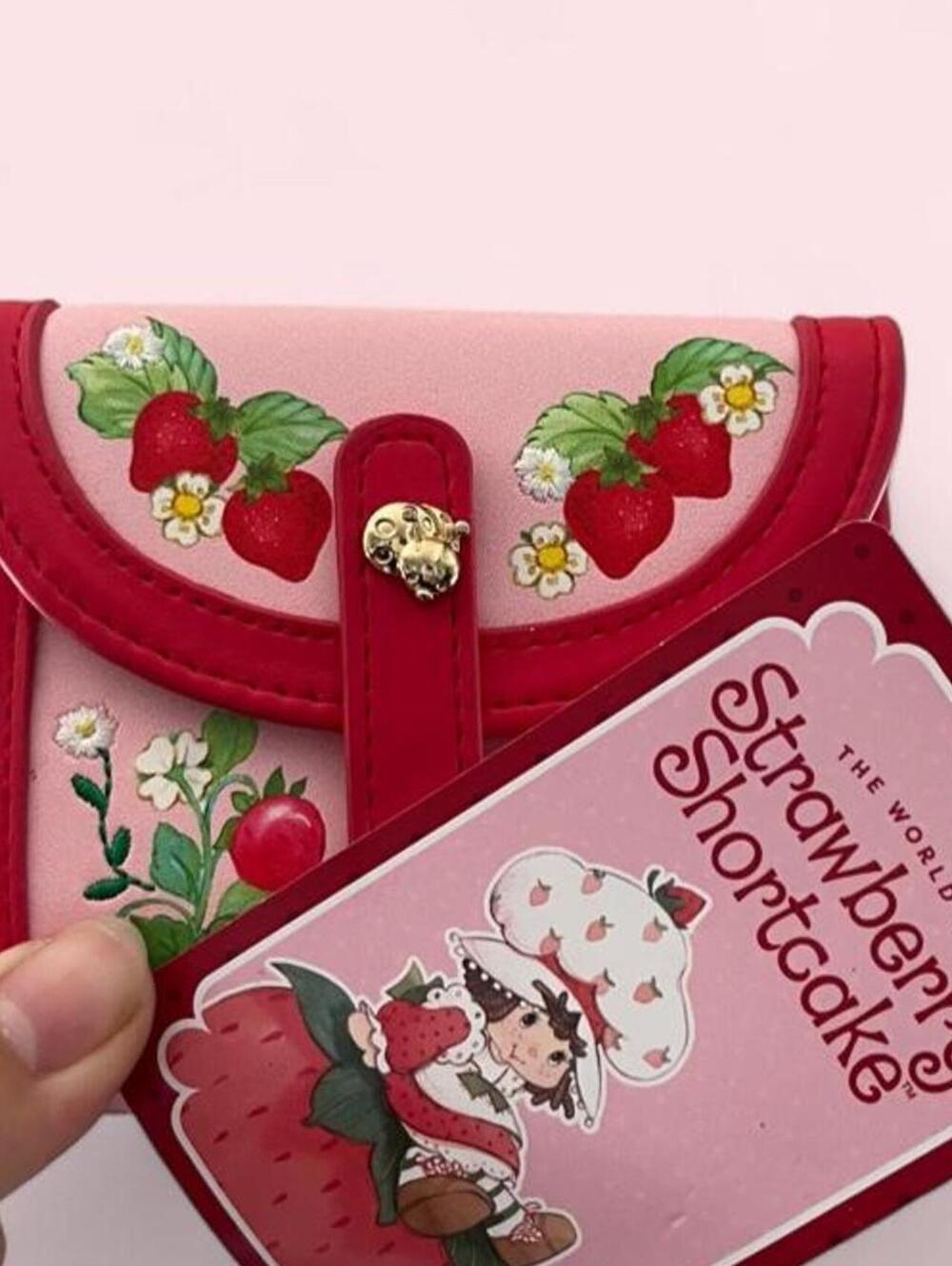 Strawberry Shortcake coin purse with tags. Loungefly Strawberry Shortcake